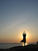 Yoga vor Sonnenuntergang